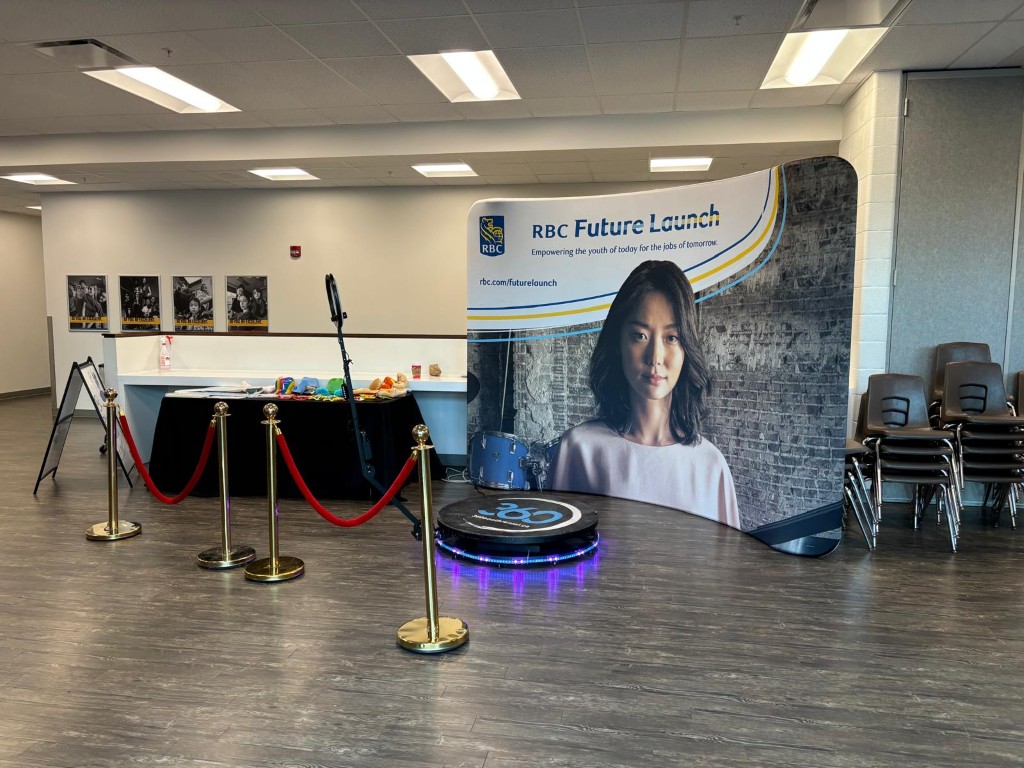 360 video booth in Guelph with stanchions and a corporate backdrop